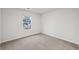 Bedroom with neutral walls, carpet and natural light at 1462 Stephens View Dr, Loganville, GA 30052