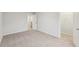 Neutral bedroom featuring plush carpet and closet access at 1462 Stephens View Dr, Loganville, GA 30052