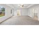 A carpeted main bedroom features tray ceilings and an ensuite bathroom at 1462 Stephens View Dr, Loganville, GA 30052