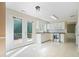 White kitchen with stainless steel appliances and access to the deck at 523 Huntgate Rd, Woodstock, GA 30189