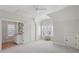 Bright bedroom featuring white walls and plantation shutters, providing a tranquil atmosphere at 5981 Brundage Ln, Norcross, GA 30071