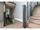 A wooden deck with steps, showing access to the basement of the home at 5981 Brundage Ln, Norcross, GA 30071