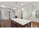 Bright kitchen featuring stainless appliances, a large island, and an open layout at 5981 Brundage Ln, Norcross, GA 30071