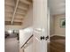Basement entrance with stairs and a glimpse into a potential living space, awaiting customization at 1053 Crane Ne Rd, Atlanta, GA 30324