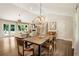 Open concept dining room, living room with staircase and hardwood floors at 1053 Crane Ne Rd, Atlanta, GA 30324