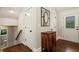 Entryway of home with hardwood floors, storage, and a door with decorative glass at 1053 Crane Ne Rd, Atlanta, GA 30324