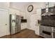 Gourmet kitchen with stainless steel appliances, granite countertops, and convenient access to pantry at 1053 Crane Ne Rd, Atlanta, GA 30324