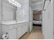 Bathroom featuring a white vanity and a door leading to the bedroom at 1850 Cotillion Dr # 3215, Atlanta, GA 30338