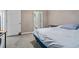 Bedroom with a bed, door, and view into the bathroom at 1850 Cotillion Dr # 3215, Atlanta, GA 30338