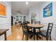 Inviting dining area with hardwood floors adjoins the living room and kitchen at 1850 Cotillion Dr # 3215, Atlanta, GA 30338