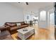 Open-concept living room features hardwood floors, neutral walls, and plenty of space for entertaining at 1850 Cotillion Dr # 3215, Atlanta, GA 30338