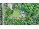 Aerial shot of a well-maintained home with a sparkling in-ground pool at 2864 Winder Hwy, Dacula, GA 30019