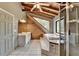 Well-lit bathroom featuring log walls, vaulted ceiling, and shower and tub at 2864 Winder Hwy, Dacula, GA 30019