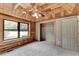Bedroom features log walls, wood ceiling, and a closet at 2864 Winder Hwy, Dacula, GA 30019