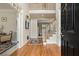 Elegant foyer with hardwood floors and a staircase leading to the upper level at 4045 Bonnett Creek Ln, Hoschton, GA 30548