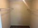 Walk-in closet with shelving units ready for organizing clothes and accessories at 1165 Oaks Pl, Stone Mountain, GA 30083