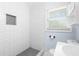 A modern bathroom features a subway tile shower with window and vanity at 1824 Atherton Dr, Decatur, GA 30035