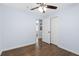 A bedroom featuring hardwood floors, ceiling fan and double closet at 1824 Atherton Dr, Decatur, GA 30035