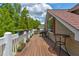 Charming deck area with planters, perfect for enjoying outdoor relaxation and entertaining at 2707 Mariner Way, Villa Rica, GA 30180