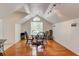 Bright dining room features hardwood floors, natural light from window, and modern lighting fixtures at 2707 Mariner Way, Villa Rica, GA 30180