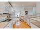 Bright kitchen with white appliances and cabinetry at 2707 Mariner Way, Villa Rica, GA 30180