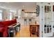 Open-concept living room with hardwood floors and ample natural light at 2707 Mariner Way, Villa Rica, GA 30180