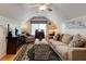Spacious living room with neutral tones, comfortable seating, and natural light at 2707 Mariner Way, Villa Rica, GA 30180