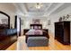 Spacious main bedroom with tray ceilings and hardwood floors at 2707 Mariner Way, Villa Rica, GA 30180