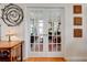 Double French doors lead to a cozy office space at 2707 Mariner Way, Villa Rica, GA 30180