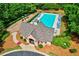Community pool and recreation area, complete with swimming pool, lounge chairs, playground, and well-maintained landscaping at 2707 Mariner Way, Villa Rica, GA 30180