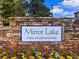 Mirror Lake entrance sign, a welcoming landmark, highlighting a lake and golf community at 2707 Mariner Way, Villa Rica, GA 30180