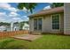 The property has a lush green backyard and includes a concrete patio at 3217 New Rutledge Nw Rd, Kennesaw, GA 30152
