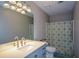 Bathroom featuring a vanity with a mirror and a shower with a patterned curtain at 3217 New Rutledge Nw Rd, Kennesaw, GA 30152