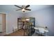 Bedroom with bunk beds, a ceiling fan, and a desk at 3217 New Rutledge Nw Rd, Kennesaw, GA 30152