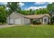 Attractive single-story home with a two-car garage and a well-manicured lawn at 3217 New Rutledge Nw Rd, Kennesaw, GA 30152