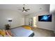 Main bedroom featuring vaulted ceiling, a ceiling fan and an ensuite bathroom at 3217 New Rutledge Nw Rd, Kennesaw, GA 30152