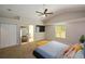 Spacious main bedroom featuring a vaulted ceiling, ceiling fan and large closet at 3217 New Rutledge Nw Rd, Kennesaw, GA 30152