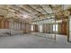 Unfinished basement with wood studs, insulation, and concrete floor at 4002 Laurel Bend Dr, Snellville, GA 30039