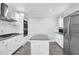 Open kitchen featuring stainless steel appliances, an island, and recessed lighting at 4002 Laurel Bend Dr, Snellville, GA 30039