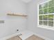 Laundry room with large window and plenty of space at 4002 Laurel Bend Dr, Snellville, GA 30039