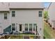 This outdoor patio features a privacy fence and backyard with plenty of room for outdoor activities at 1347 Elderwood Way, Cumming, GA 30041