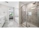 Bathroom featuring double vanity and large glass shower at 1347 Elderwood Way, Cumming, GA 30041