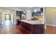 A kitchen featuring a granite island, stainless appliances, and sleek cabinetry at 2058 Bonneville Ln, Powder Springs, GA 30127