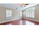 Living room featuring hardwood floors and large windows at 2058 Bonneville Ln, Powder Springs, GA 30127