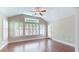 Bright living room with hardwood floors and lots of natural light at 2058 Bonneville Ln, Powder Springs, GA 30127