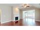 Cozy living room featuring a fireplace and hardwood floors at 2058 Bonneville Ln, Powder Springs, GA 30127