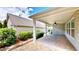 Covered patio with brick floors, perfect for outdoor entertaining at 2058 Bonneville Ln, Powder Springs, GA 30127
