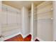 Spacious walk-in closet with ample shelving for storage and organization at 2058 Bonneville Ln, Powder Springs, GA 30127