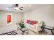 Basement living area with neutral carpet and furniture plus a glimpse into another room at 2121 Silva Ct, Conley, GA 30288