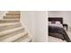 Basement stairs leading to a bedroom, showing the potential for a private living space at 2121 Silva Ct, Conley, GA 30288